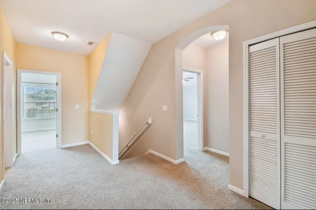 a view of a livingroom with an entryway