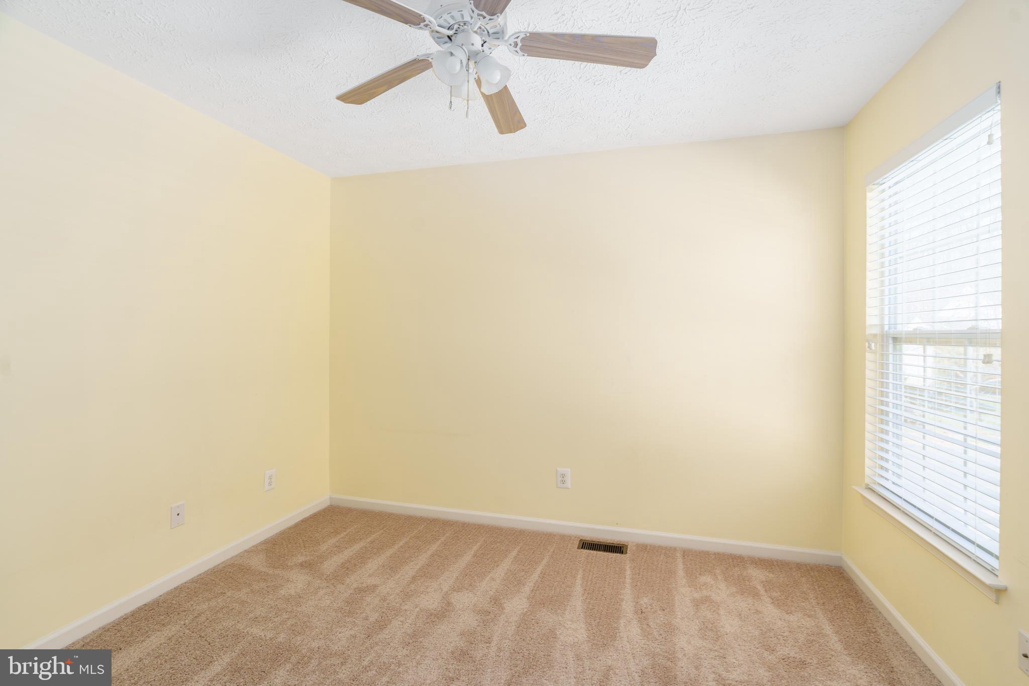 248 Patriots Way Elkton, MD 21921 - Photo 17 of 40 an empty room with a window