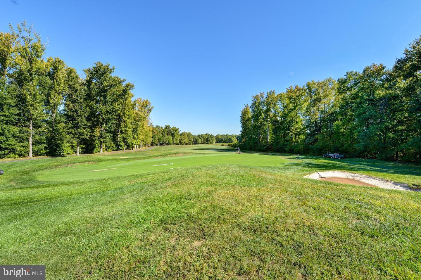 248 Patriots Way Elkton, MD 21921 - Photo 29 of 40 a view of a field with trees in the background