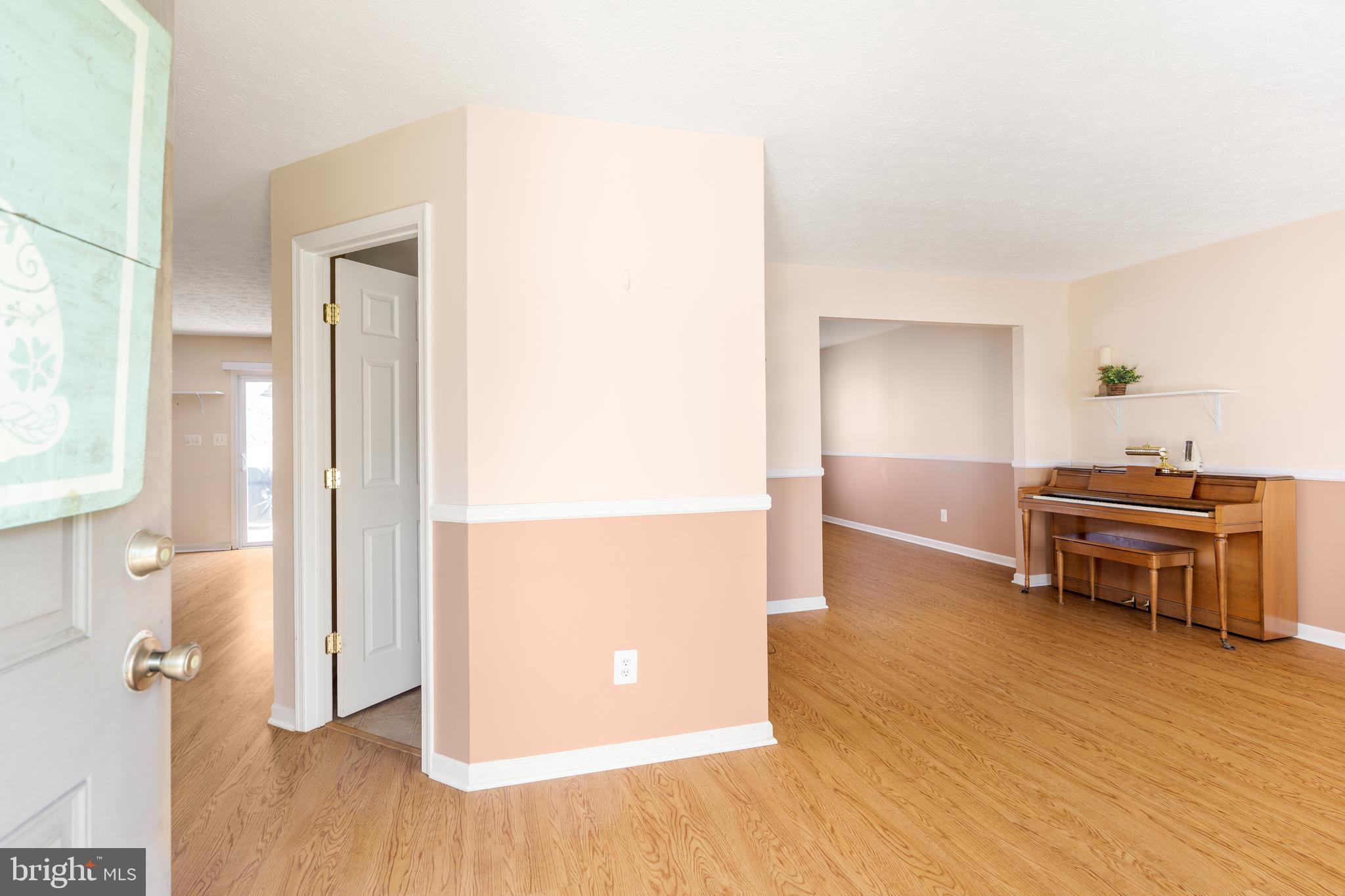 248 Patriots Way Elkton, MD 21921 - Photo 3 of 40 a view of livingroom with furniture and wooden floor