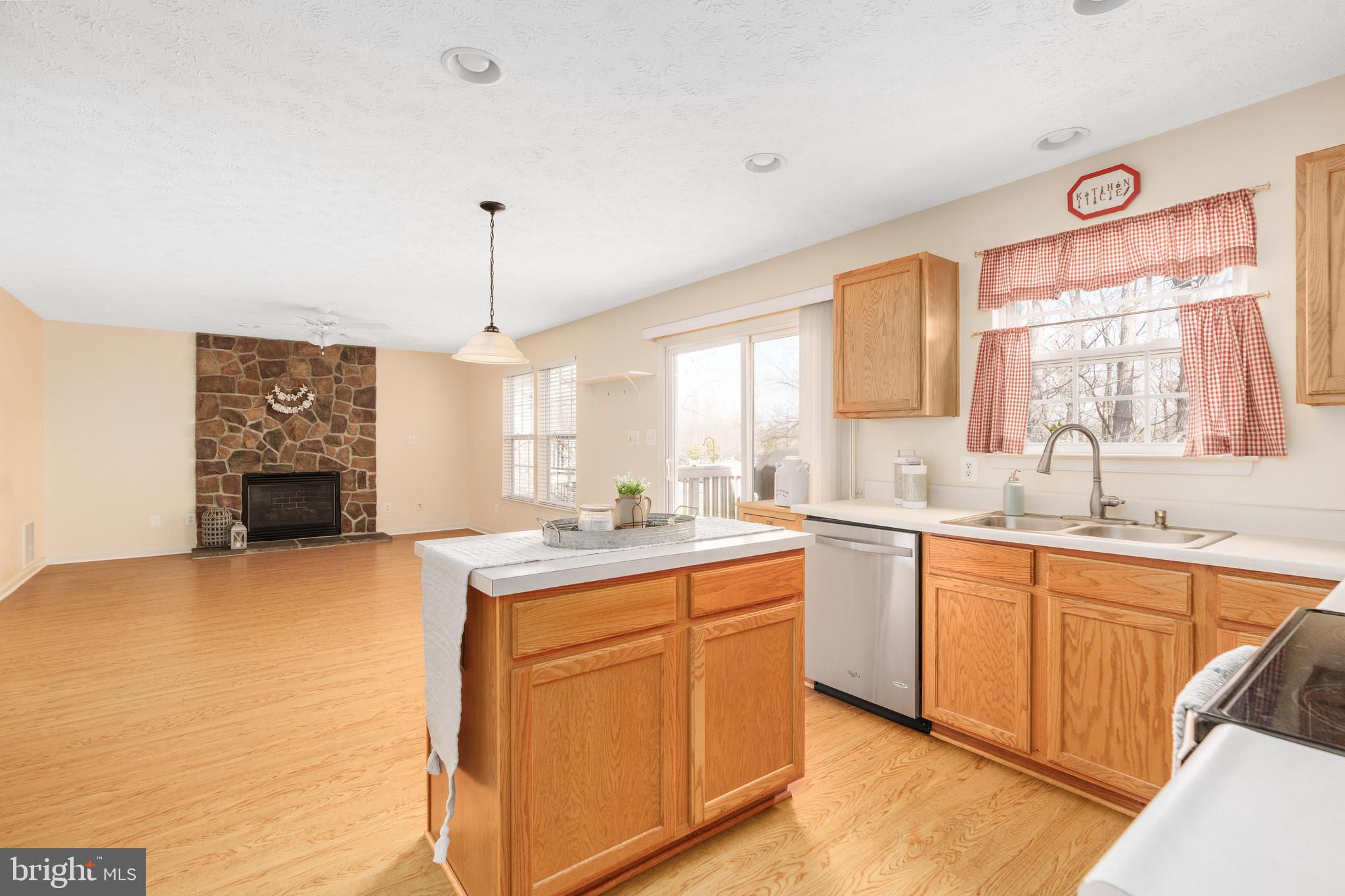 248 Patriots Way Elkton, MD 21921 - Photo 6 of 40 a kitchen with sink cabinets and window