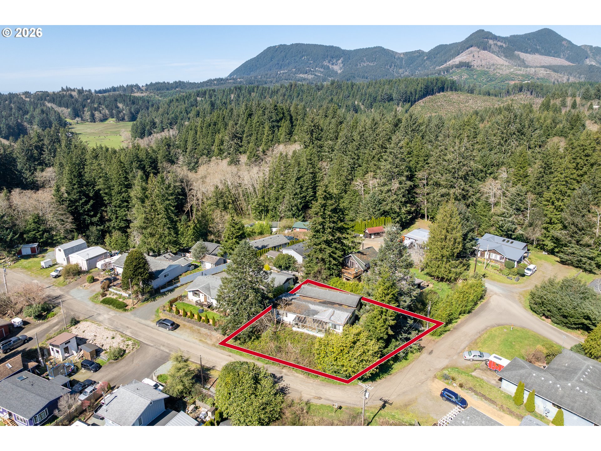 12850 Hayes Drive Nehalem, OR 97131 - Photo 1 of 9 a view of lake and mountain