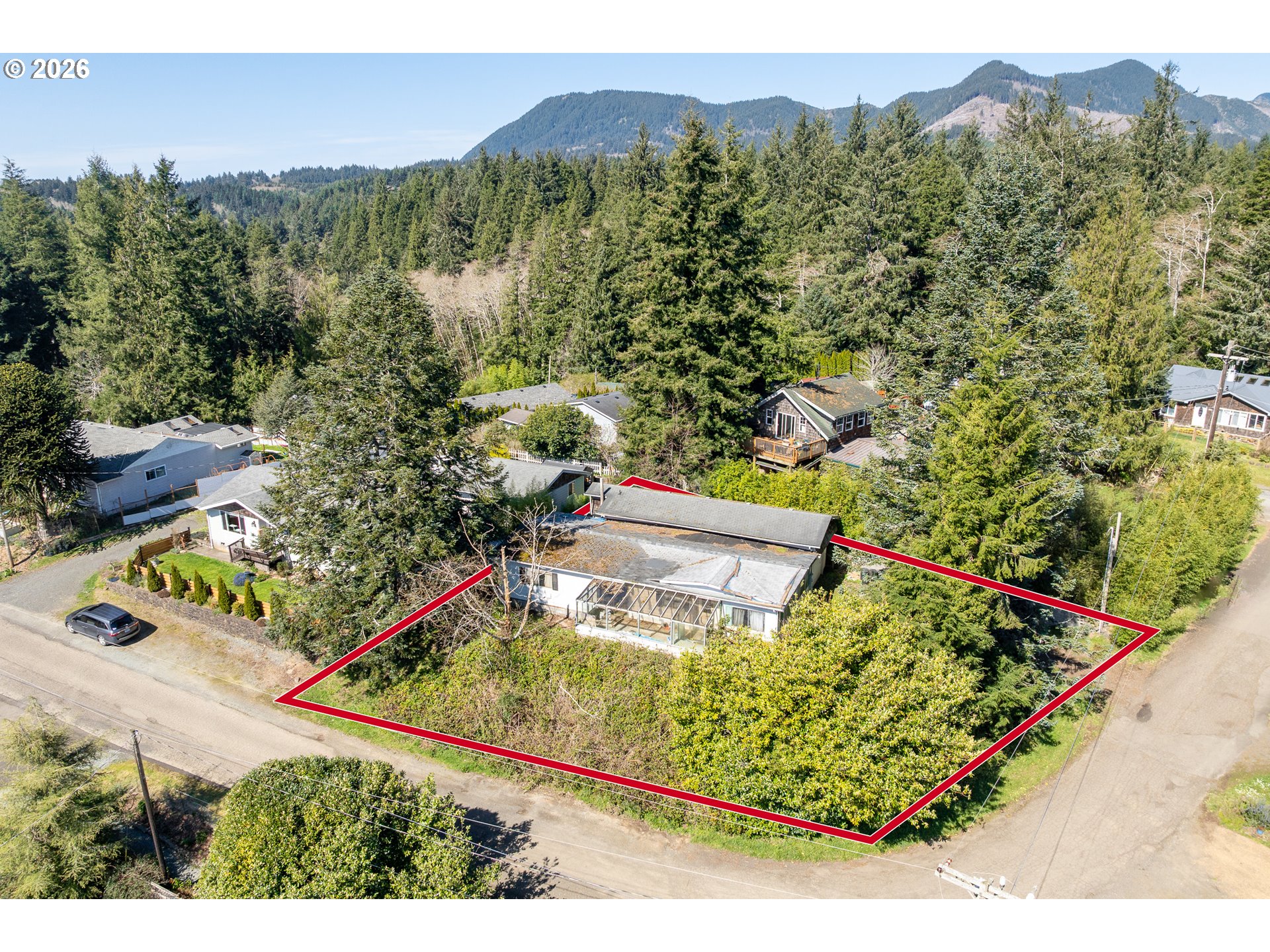 12850 Hayes Drive Nehalem, OR 97131 - Photo 3 of 9 view of a tennis court with a city view