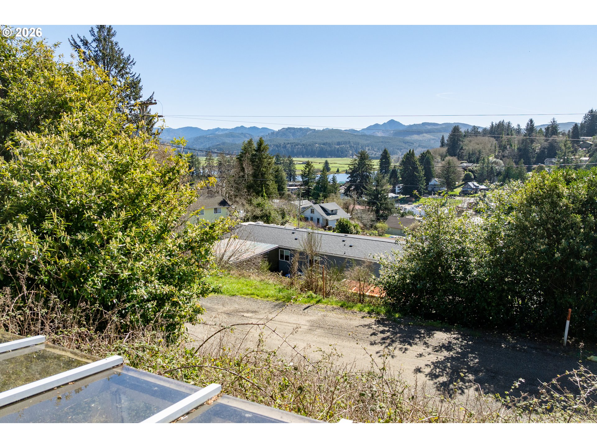 12850 Hayes Drive Nehalem, OR 97131 - Photo 5 of 9 a view of a city from a terrace