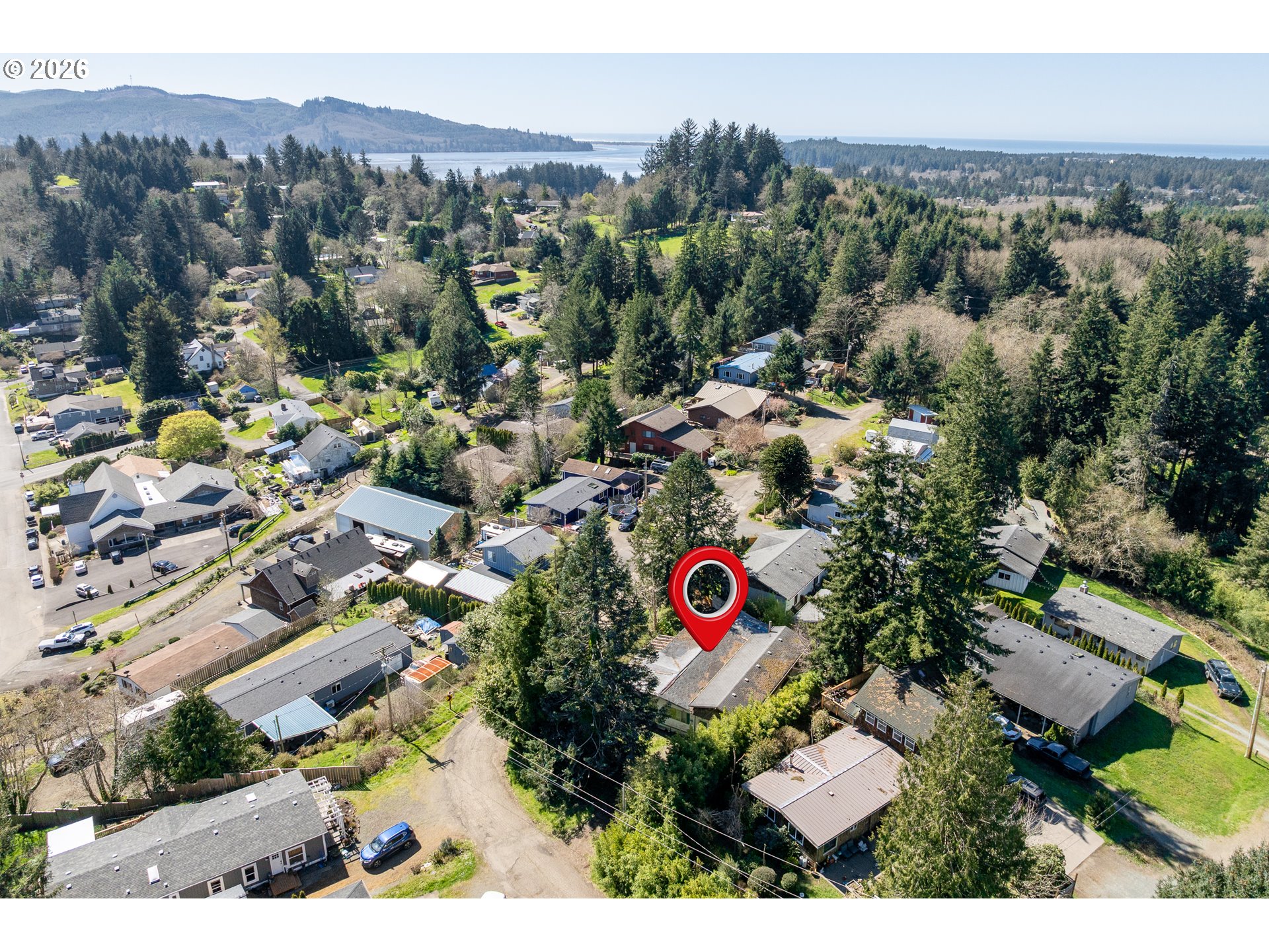 12850 Hayes Drive Nehalem, OR 97131 - Photo 6 of 9 an aerial view of a and mountain view