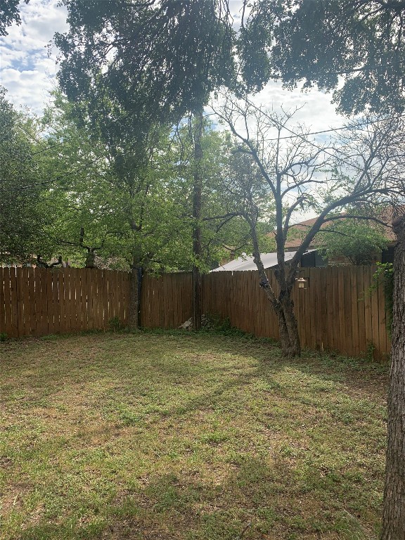 11701 Bayou Bend, Unit B Austin, TX 78759 - Photo 15 of 17 a view of a backyard