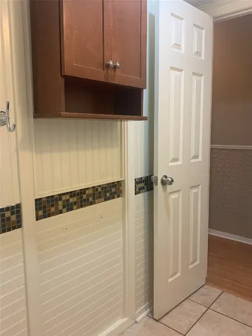 a bathroom with a toilet and a sink