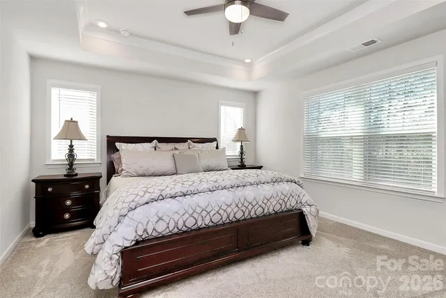 a bedroom with a bed and a closet