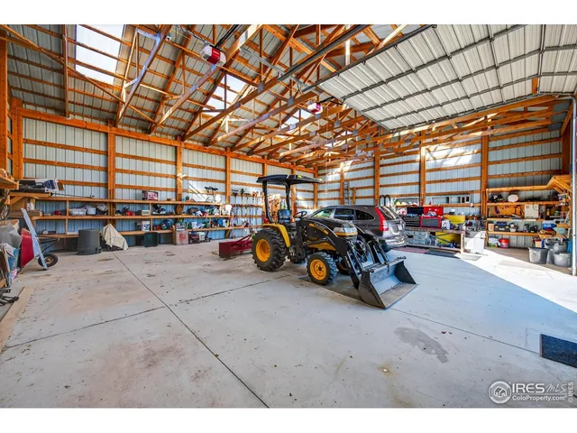 a view of parking garage with cars