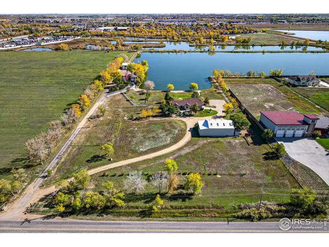 an aerial view of a house with outdoor space