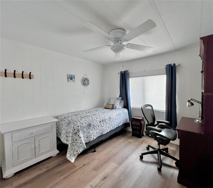 1100 South Belcher Road, Unit 772 Largo, FL 33771 - Photo 32 of 84 a bedroom with a workspace