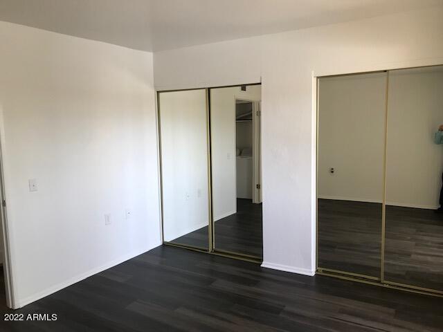 12221 West Bell Road, Unit 280 Surprise, AZ 85378 - Photo 14 of 16 Bedroom with Double Mirrored Closet Door