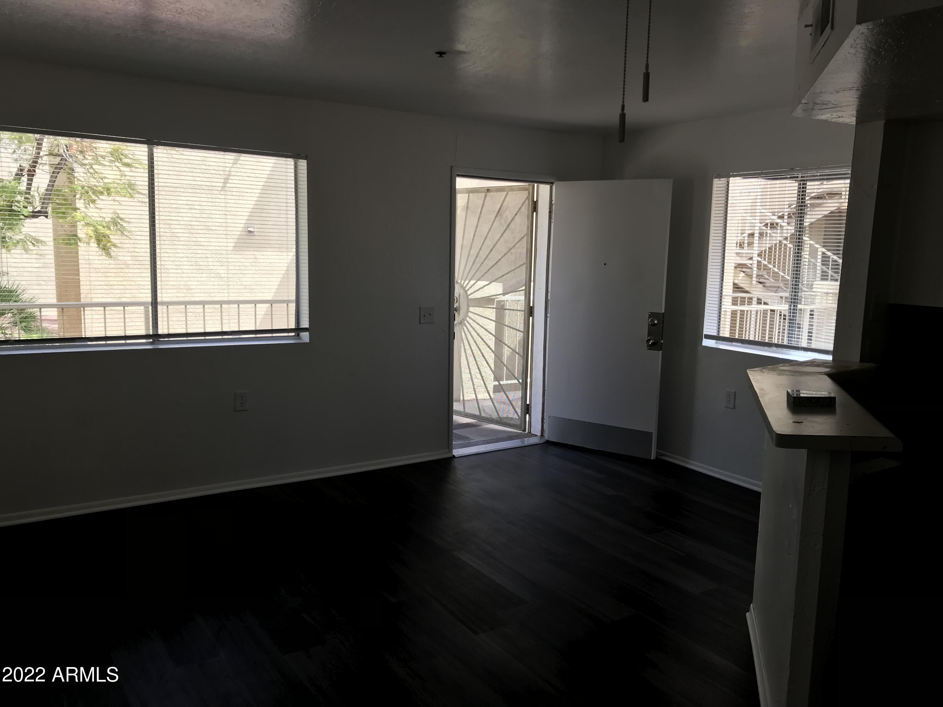 12221 West Bell Road, Unit 280 Surprise, AZ 85378 - Photo 8 of 16 Livingroom Kitchen Area