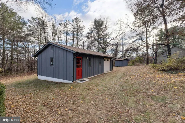 a view of a backyard of the house