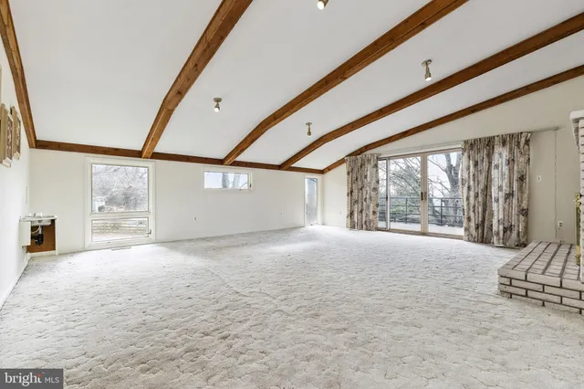 a bathroom with a double vanity sink toilet mirror and shower