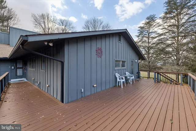 a patio with table and chairs