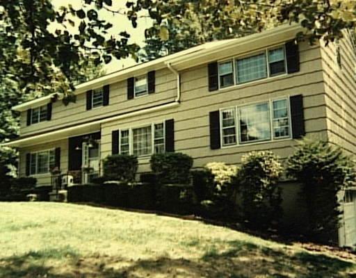 80 Holmes Road Ridgefield, CT 06877 - Photo 1 of 1 a front view of a house