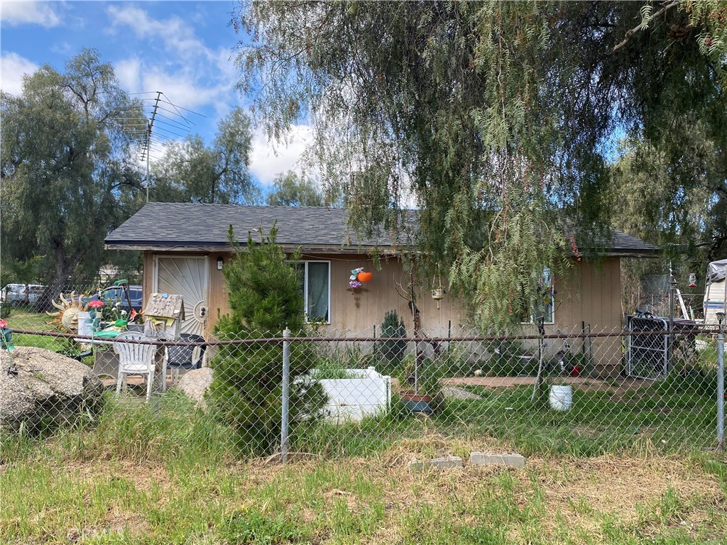 24021 Keen Road Homeland, CA 92548 - Photo 1 of 1 a view of a chair and table in backyard of the house