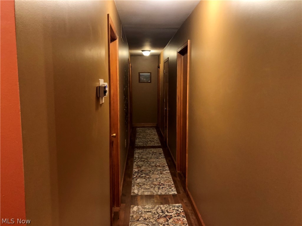 17031 Quarry Road Wellington, OH 44090 - Photo 5 of 31 hallway to bedrooms