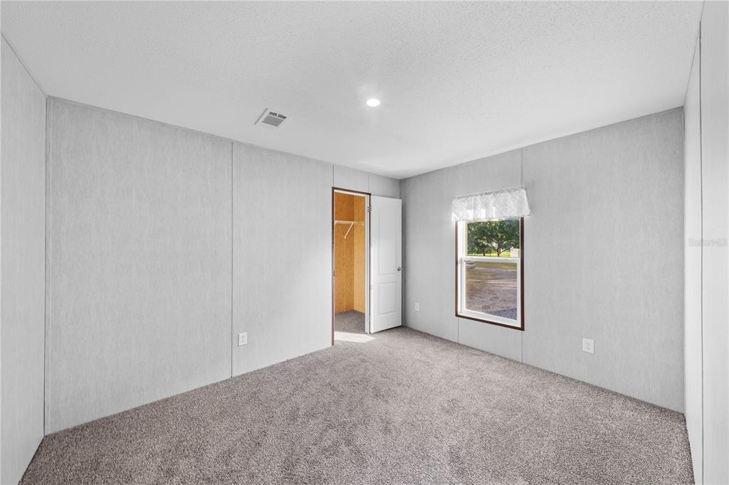 9160 Southwest 31st Avenue Road Ocala, FL 34476 - Photo 20 of 30 a view of an empty room with a window