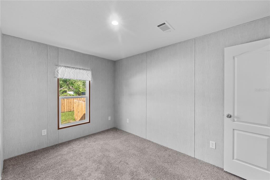 9160 Southwest 31st Avenue Road Ocala, FL 34476 - Photo 24 of 30 a view of an empty room with a window