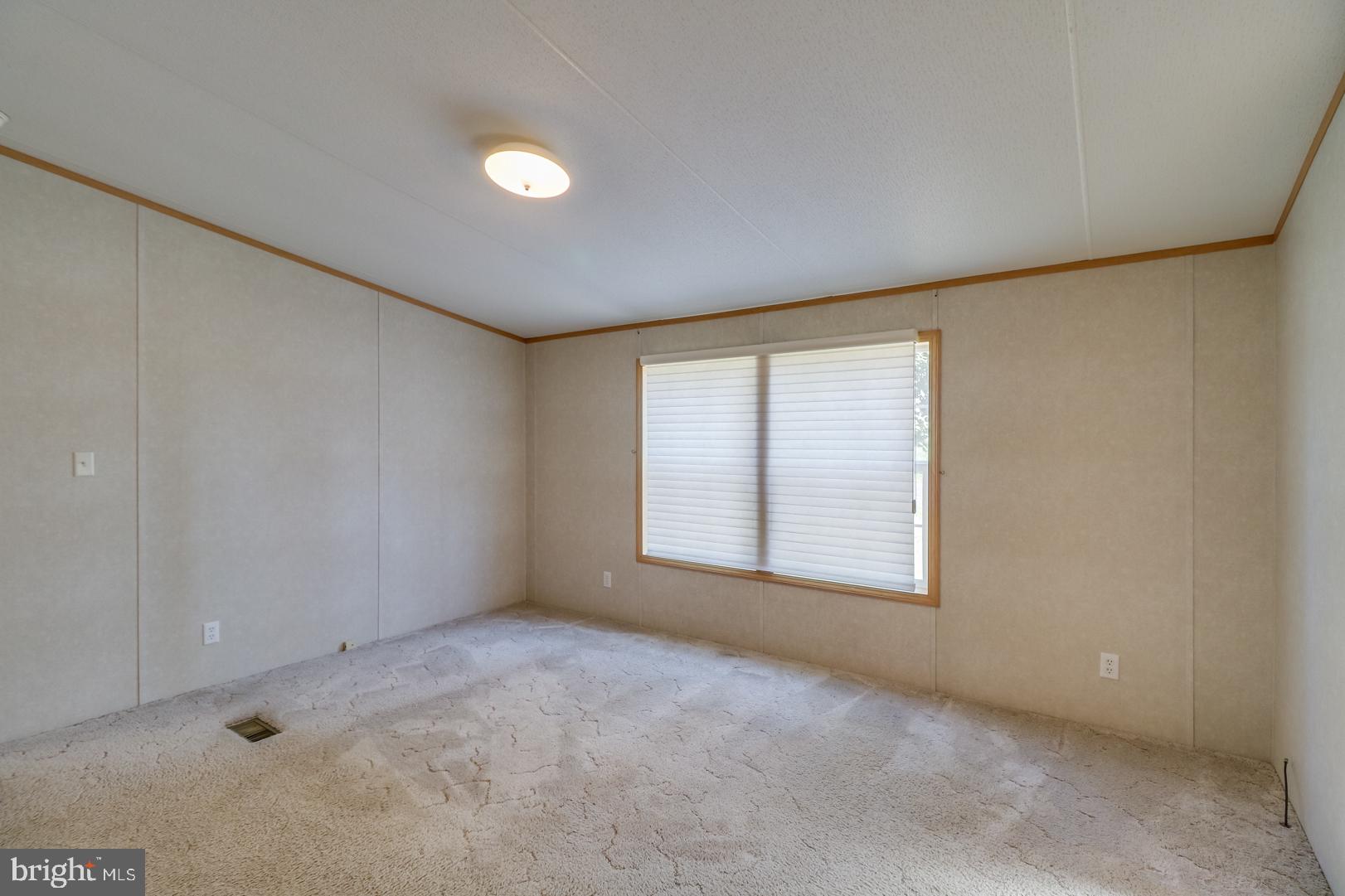 7052 Slaughter Beach Road Milford, DE 19963 - Photo 14 of 27 Master Bedroom