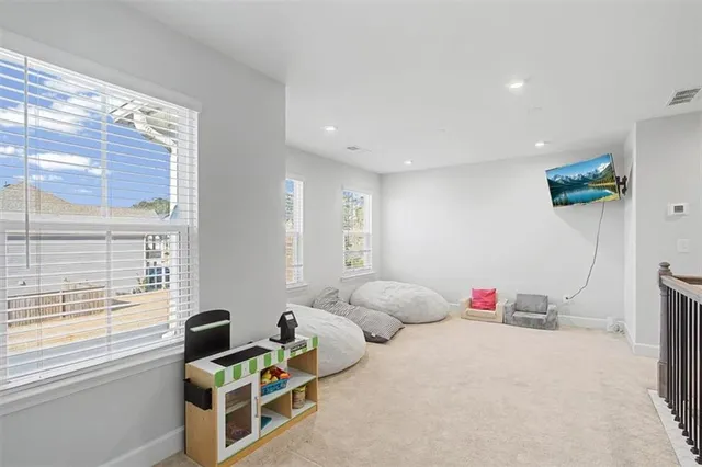 a room with furniture and a window