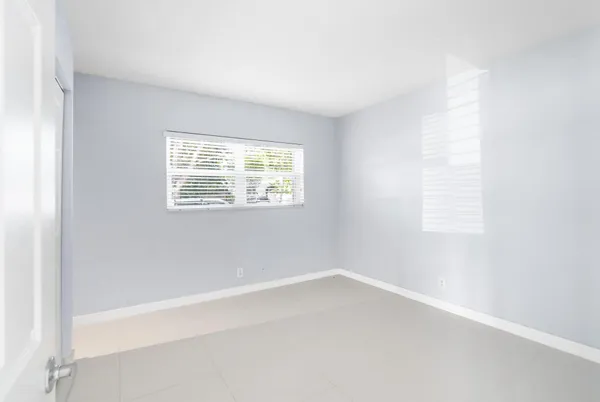 an empty room with a window