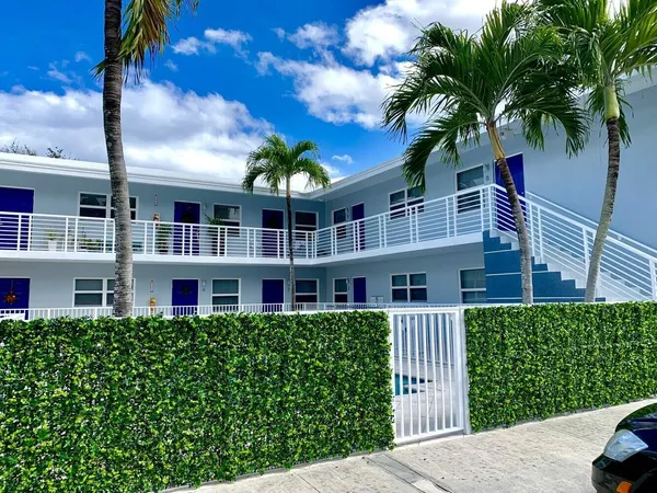 a view of a house with a garden