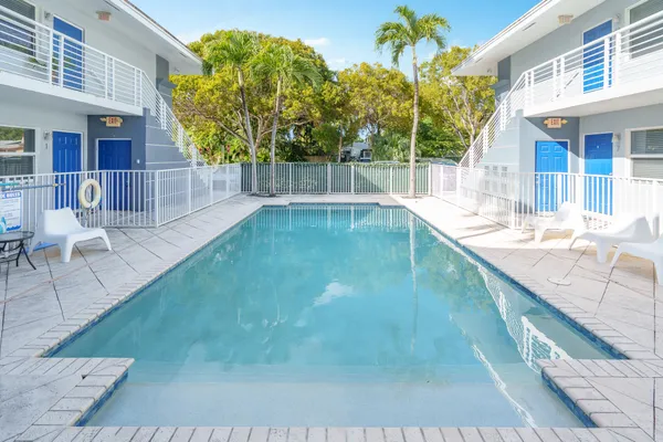 a view of a swimming pool with a patio