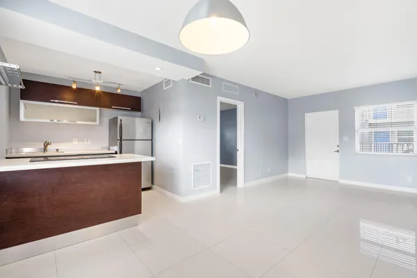 a view of kitchen and a window