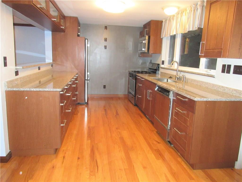 108 North Pike Road Sarver, PA 16055 - Photo 3 of 25 Lots of counter space, large updated window over sink and wall opened up over counter to living room.