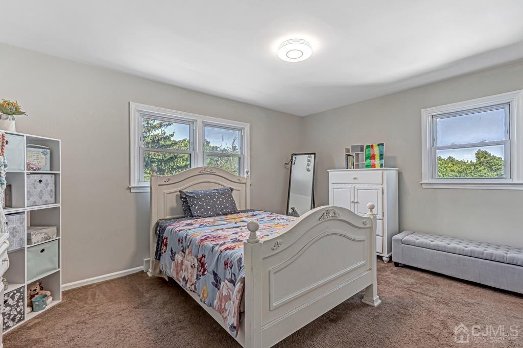 528 Melrose Avenue Middlesex, NJ 08846 - Photo 20 of 40 a bedroom with a bed and a window