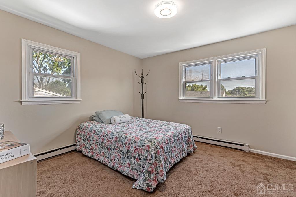 528 Melrose Avenue Middlesex, NJ 08846 - Photo 21 of 40 a bedroom with a bed and a window