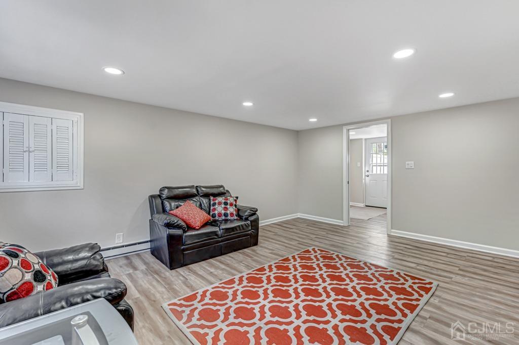 528 Melrose Avenue Middlesex, NJ 08846 - Photo 23 of 40 a living room with furniture and a rug