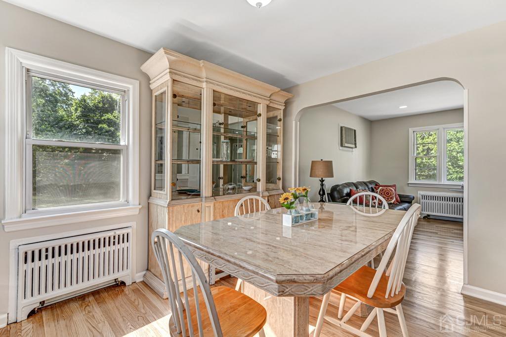 528 Melrose Avenue Middlesex, NJ 08846 - Photo 3 of 40 a view of a dining room with furniture window and wooden floor
