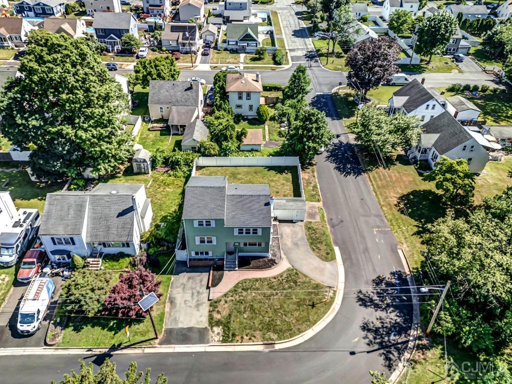528 Melrose Avenue Middlesex, NJ 08846 - Photo 31 of 40 an aerial view of a house with a garden and lake view