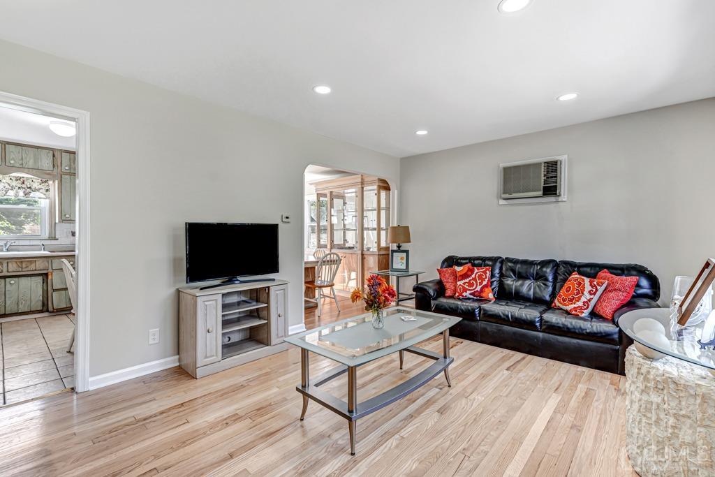 528 Melrose Avenue Middlesex, NJ 08846 - Photo 6 of 40 a living room with furniture and a flat screen tv