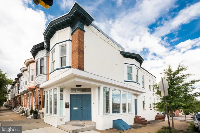 a view of a building with a street