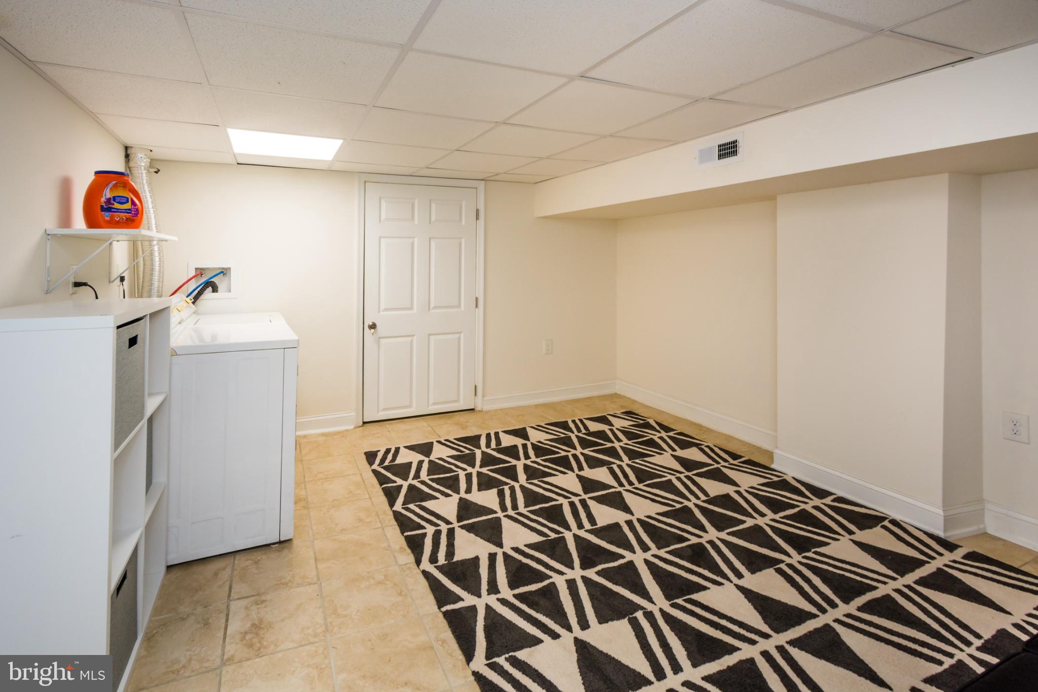 600 South Linwood Avenue, Unit A Baltimore, MD 21224 - Photo 28 of 33 a storage & utility room with a sink