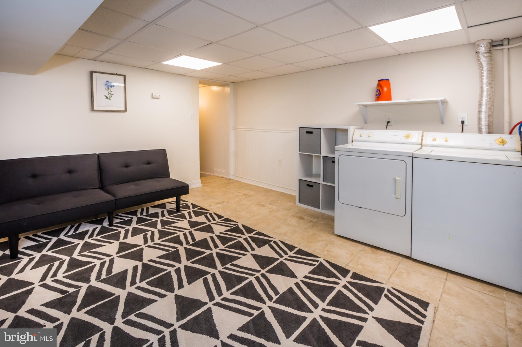 600 South Linwood Avenue, Unit A Baltimore, MD 21224 - Photo 30 of 33 a workspace with furniture and window