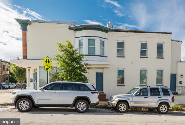 a car parked in front of a house