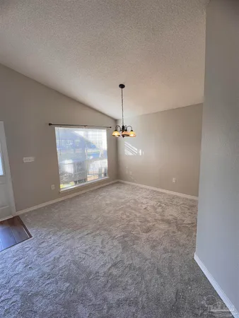 a view of a room with window wooden floor and windows