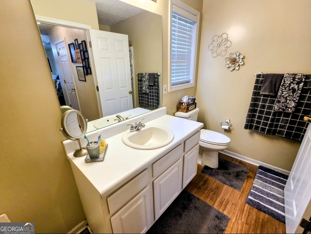 21 Baskin Heights Path Temple, GA 30179 - Photo 20 of 44 a bathroom with a sink toilet and shower
