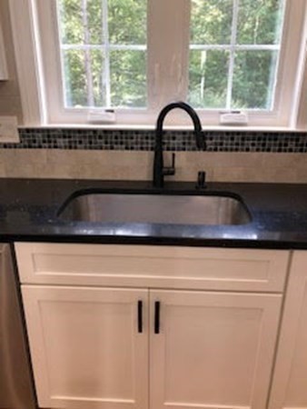 49 Ridge View Road Northampton, MA 01062 - Photo 14 of 32 a close view of sink and tap