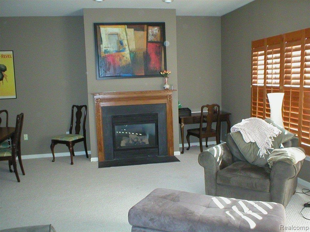 702 Cherry Orchard Road, Unit 158 Canton, MI 48188 - Photo 1 of 19 GR & Fireplace.JPG