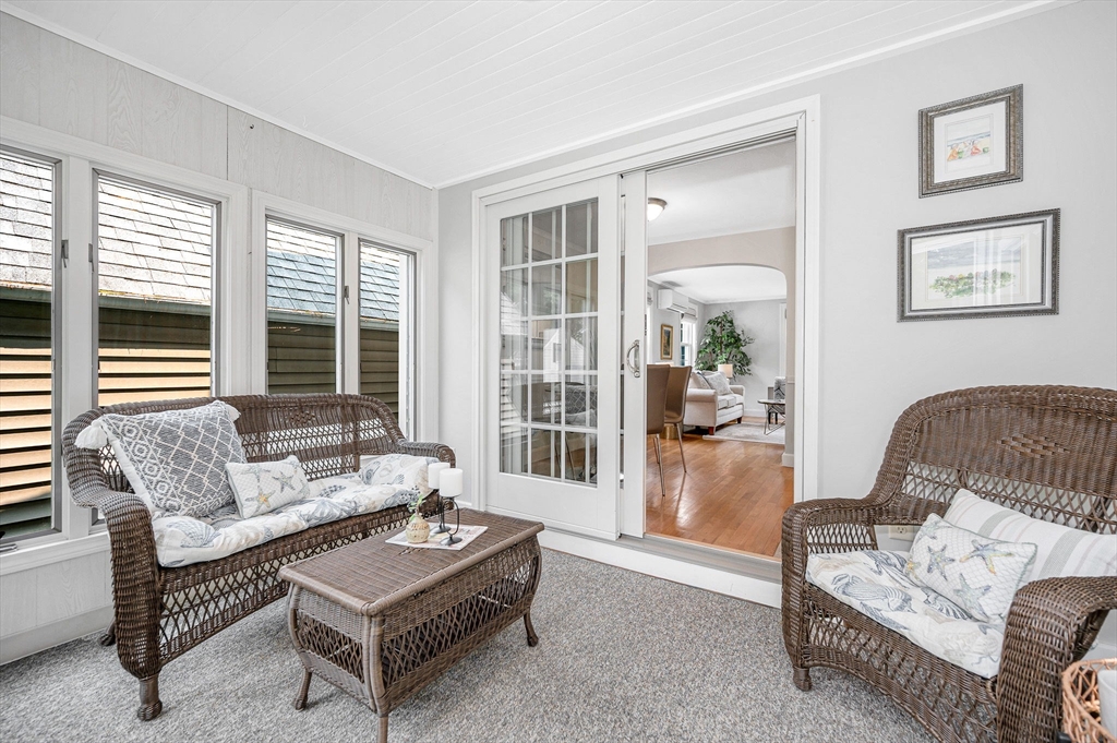 15 Eustis Avenue Wakefield, MA 01880 - Photo 11 of 42 a living room with furniture and a large window