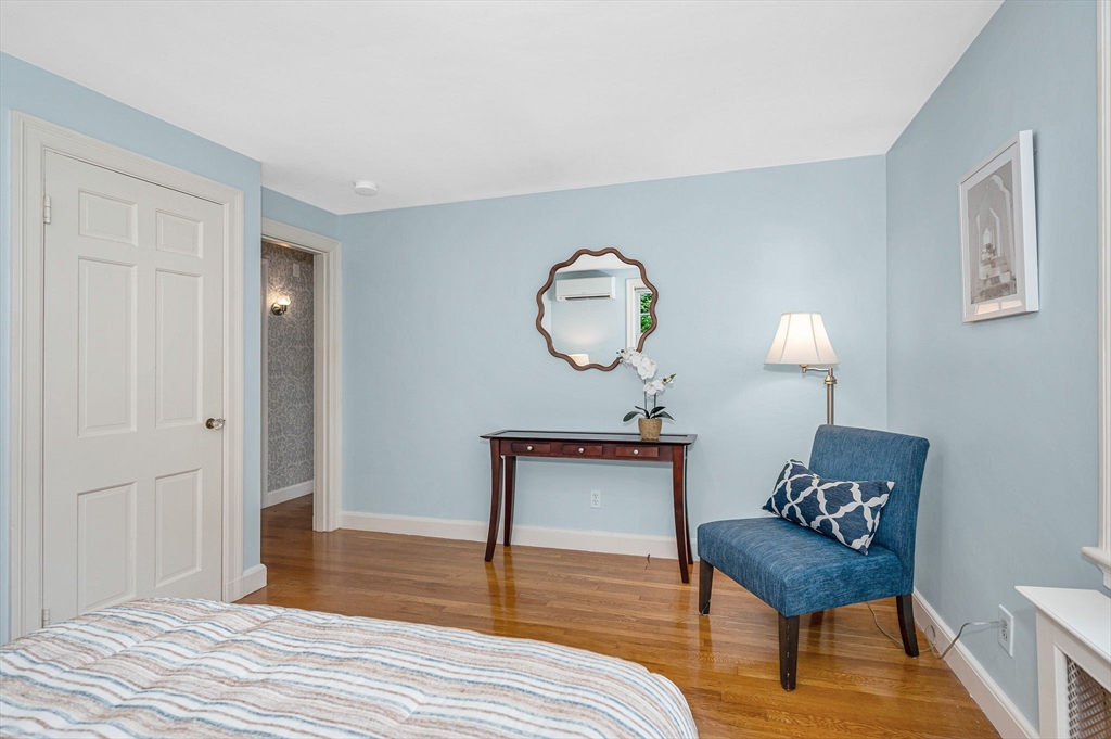 15 Eustis Avenue Wakefield, MA 01880 - Photo 14 of 42 a bedroom with bed and a wooden floor