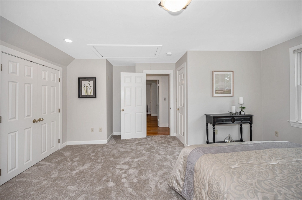 15 Eustis Avenue Wakefield, MA 01880 - Photo 21 of 42 a bedroom with a bed and a table