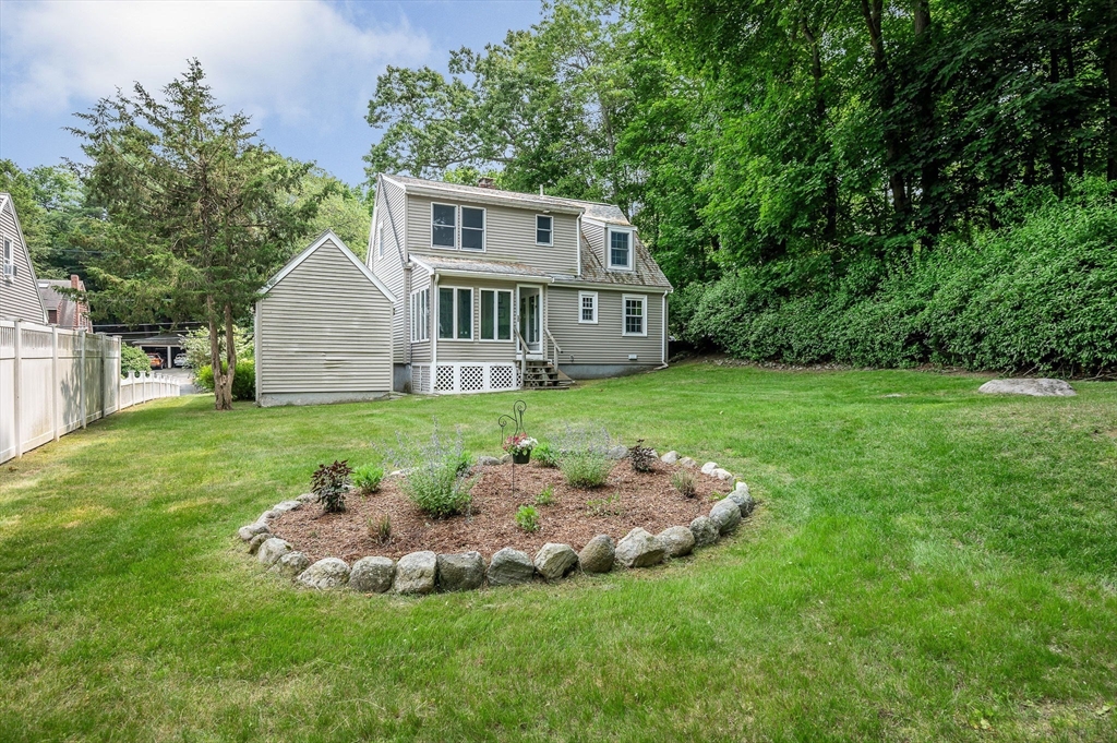 15 Eustis Avenue Wakefield, MA 01880 - Photo 35 of 42 a view of a house with a yard and sitting area